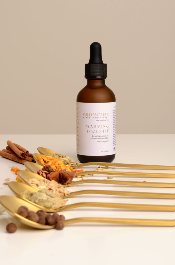 Citrus Berry Immunity Blend Tea in a Glass Cup with Lemon Wedge